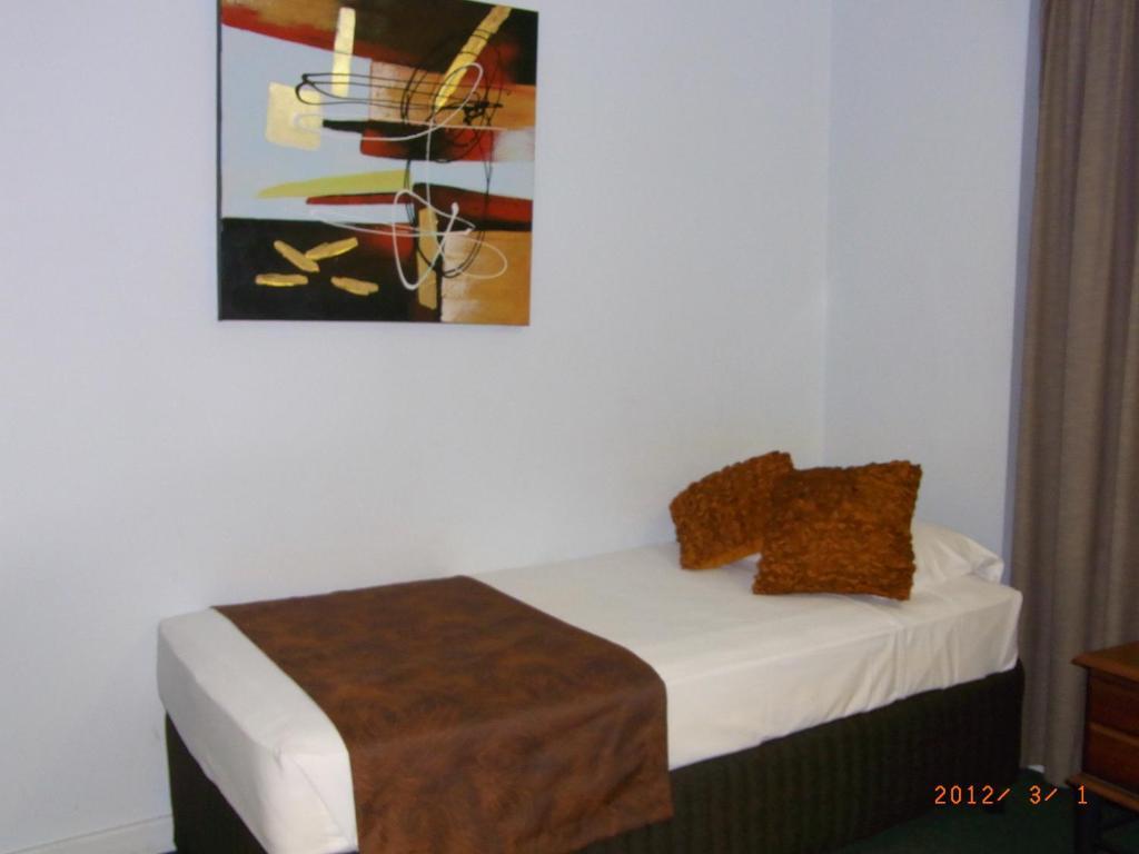 Coral Towers Holiday Suites Кернс Стая снимка